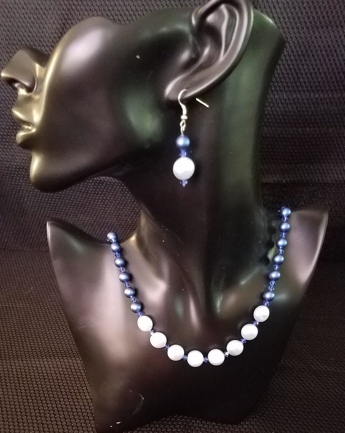 Swarovski pearl and crystal necklace and earring set.