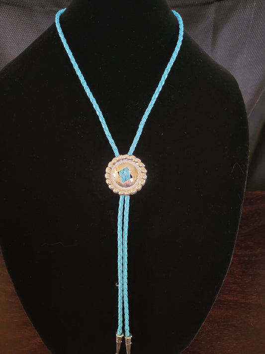 Bolo tie with blue leather, 36 inches