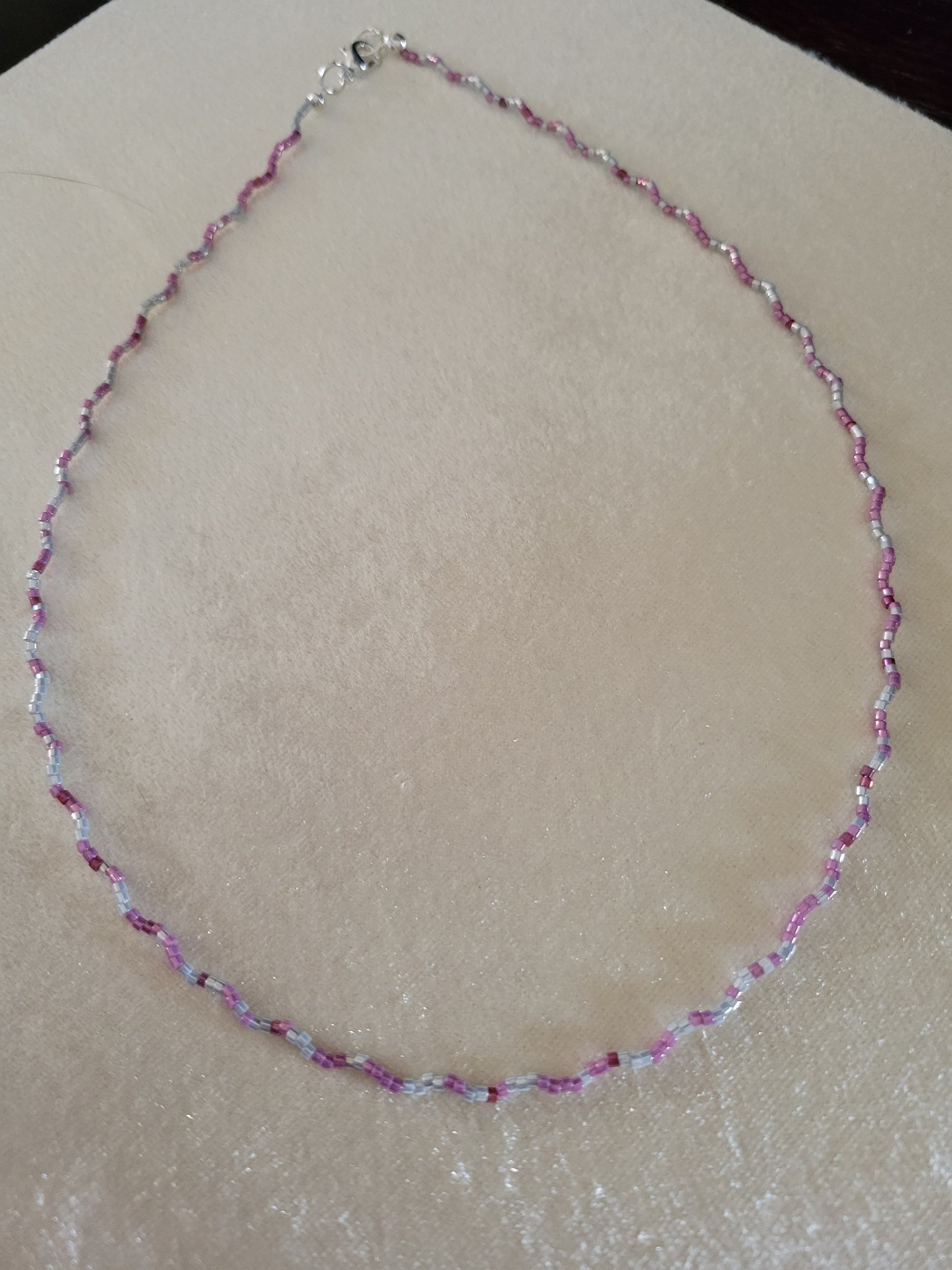 Lite gray and mauve seed bead necklace on wacky wire,17 inches