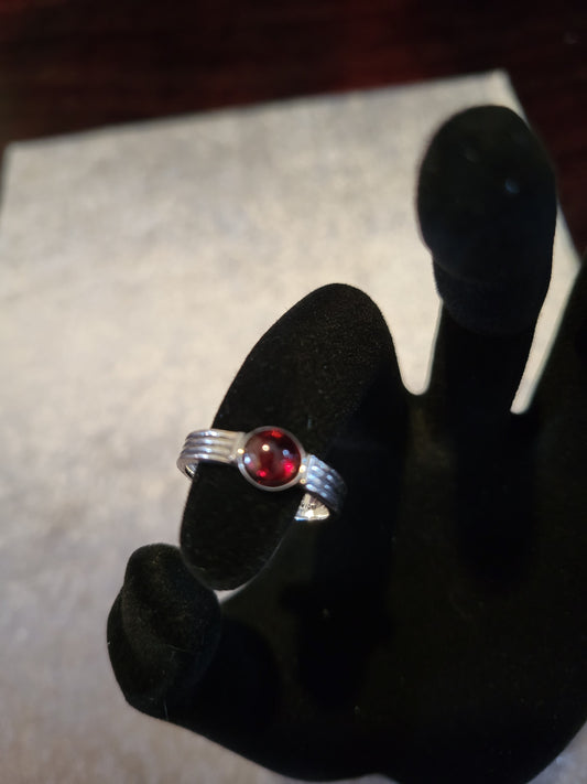 Sterling silver ring with garnet center, size 7