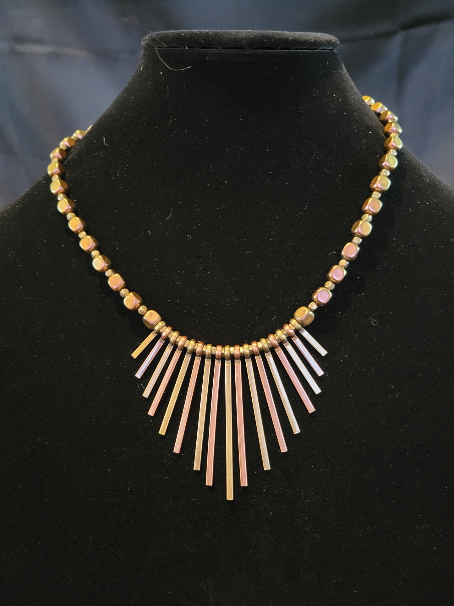 Copper and antique gold colored fan necklace with earring set