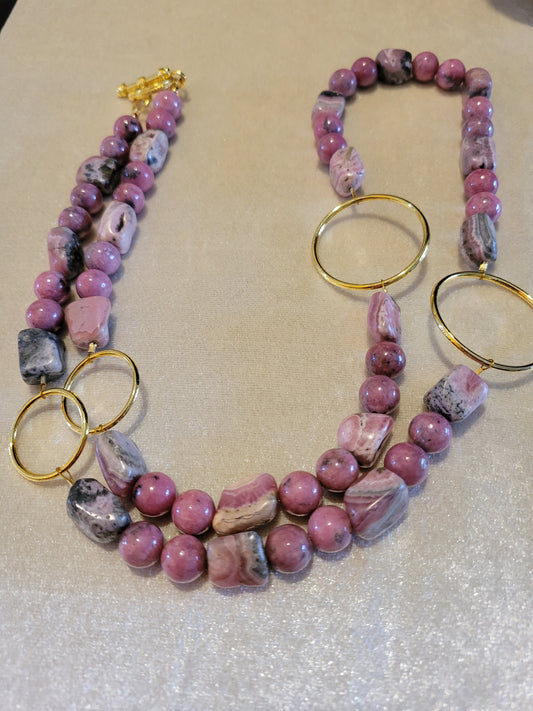 Rhodonite beads with gold tone circles, 32 inches