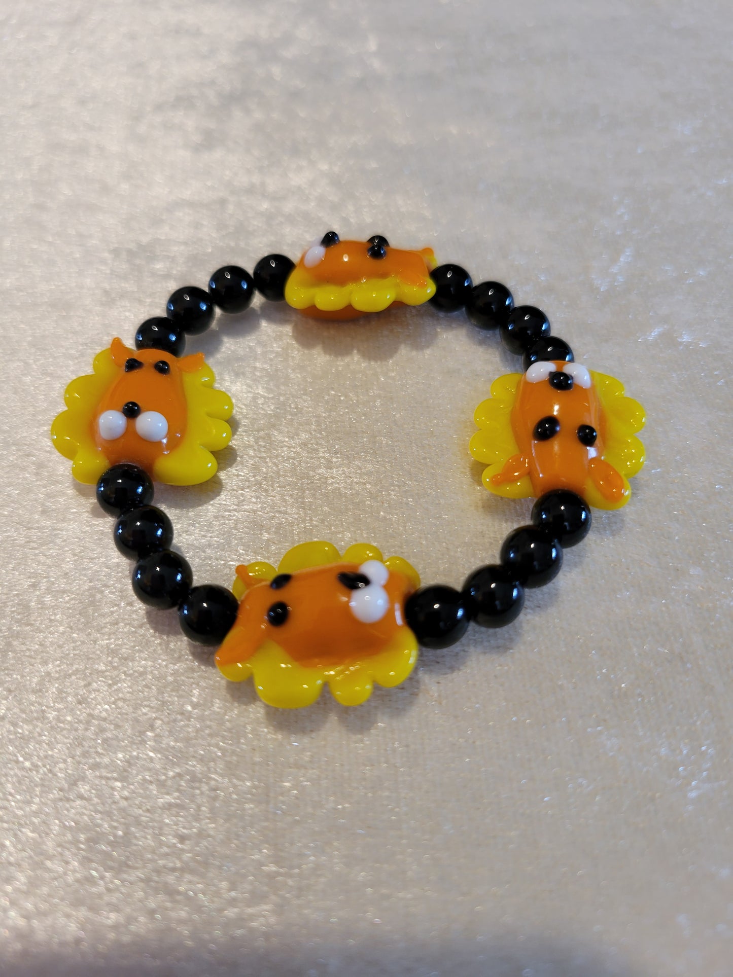 Lion head and black onyx bracelet, size 6