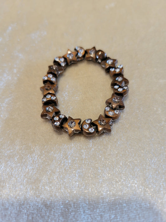 Childs stretch brown moon and star bracelet, size 2