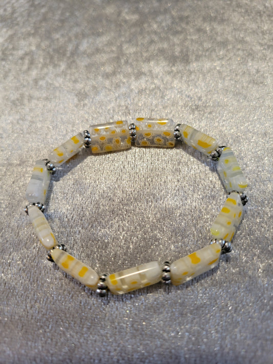 Yellow flowered glass disk stretch bracelet, size 7