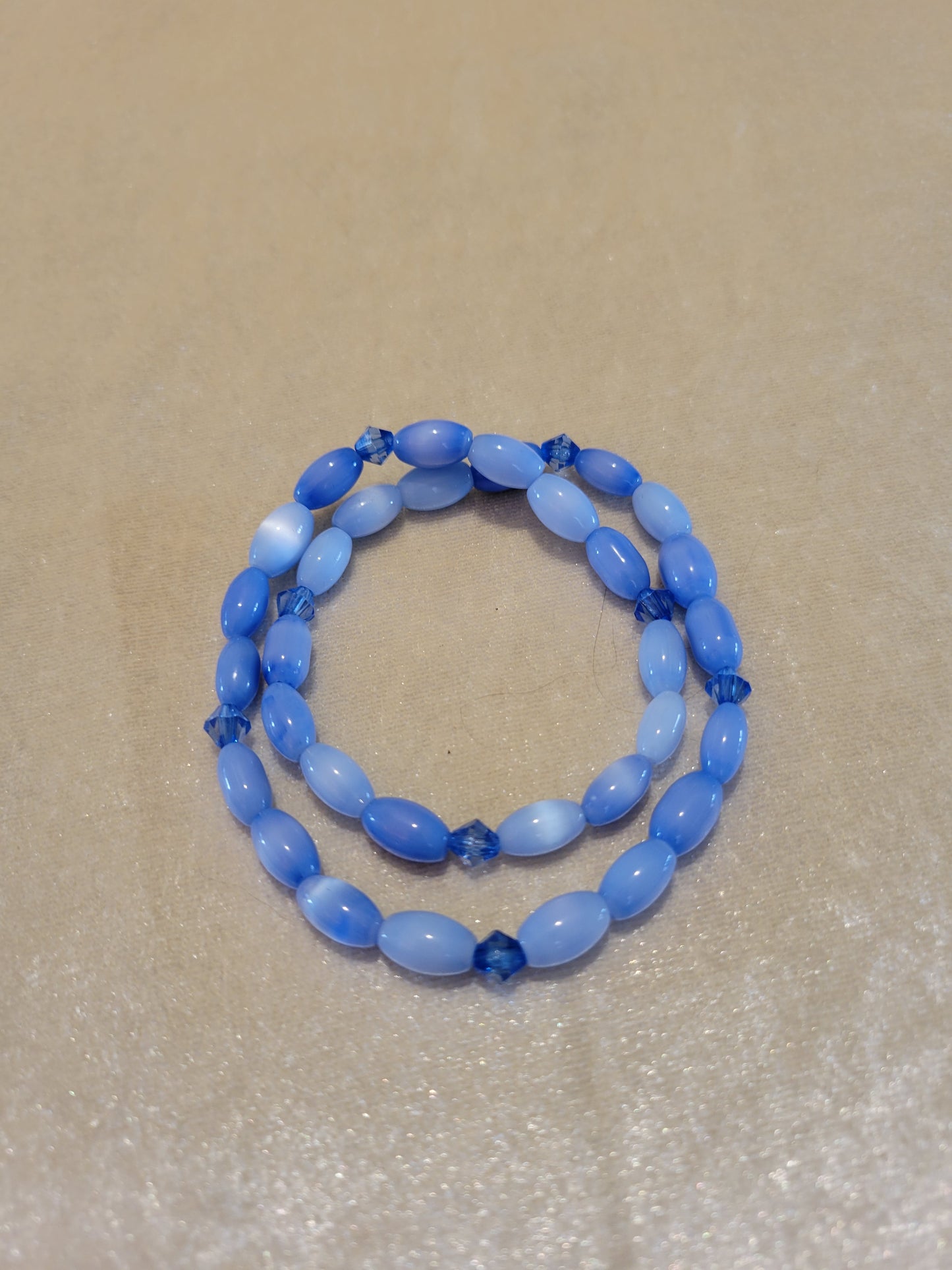 Blue cats' eye glass bead with blue crystal stretch bracelet,12 inches