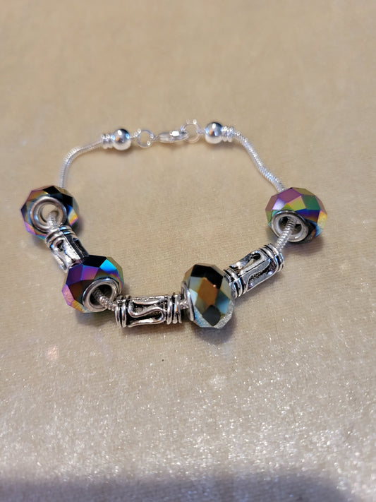 Silver tone Dione bracelet with rainbow beads