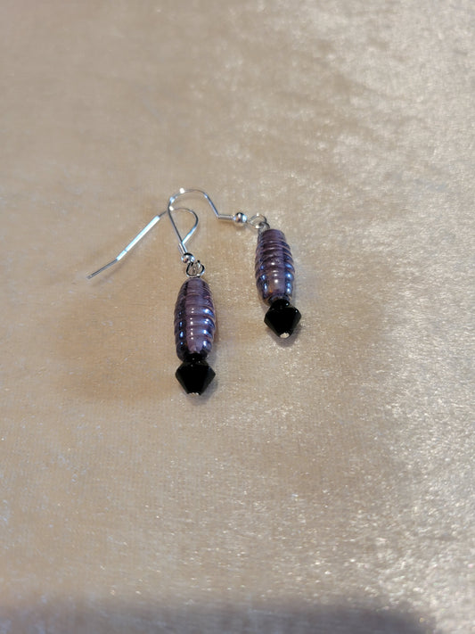 Earrings, purple tubular glass bead with onyx.