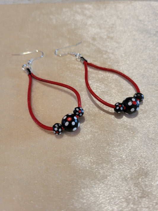 Earrings, red leather with black and white spotted beads