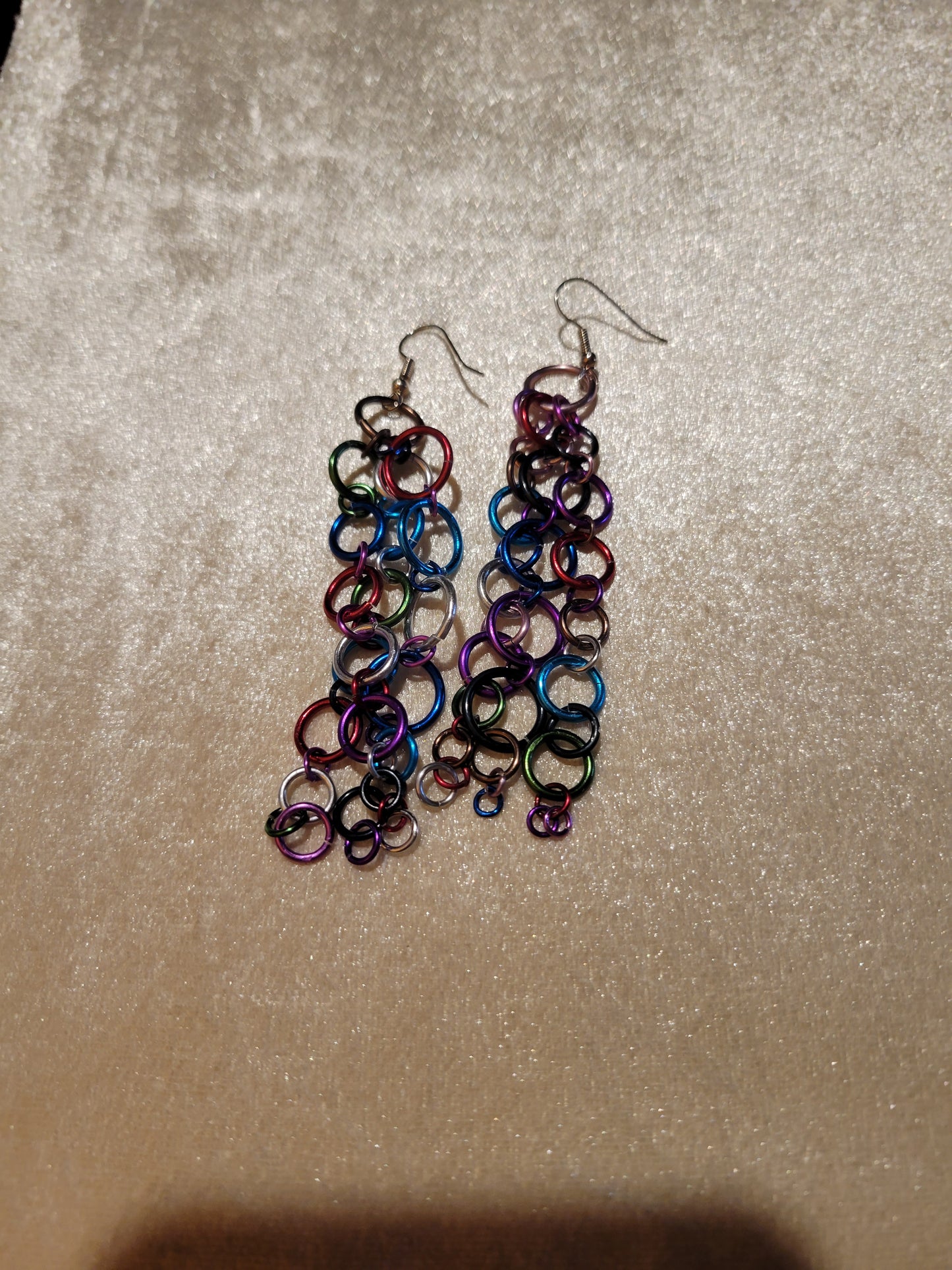 Dangle earrings of colored O-rings