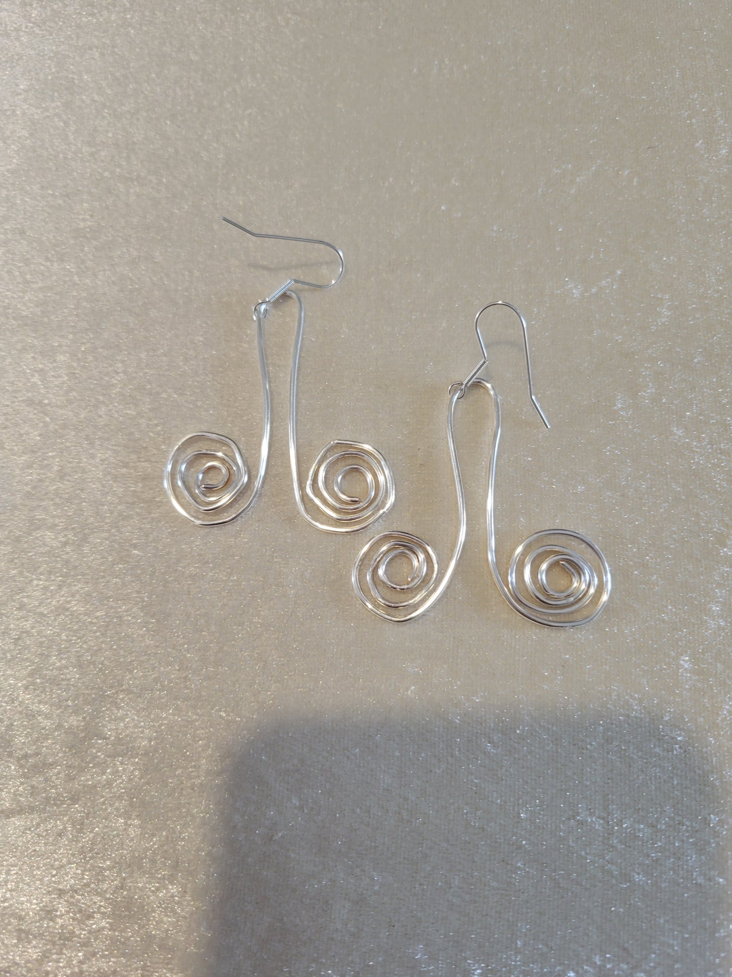 Silver colored wire wacky earrings